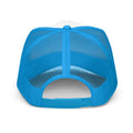 Back view of abstract aesthetic W foam trucker hat with blue mesh and adjustable snap closure.