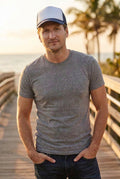 Abstract Aesthetic B Foam trucker hat — golden hour lifestyle